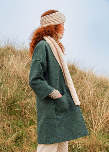 Cashmere Ivory scarf shown on model at beach. Scottish Textiles Showcase.