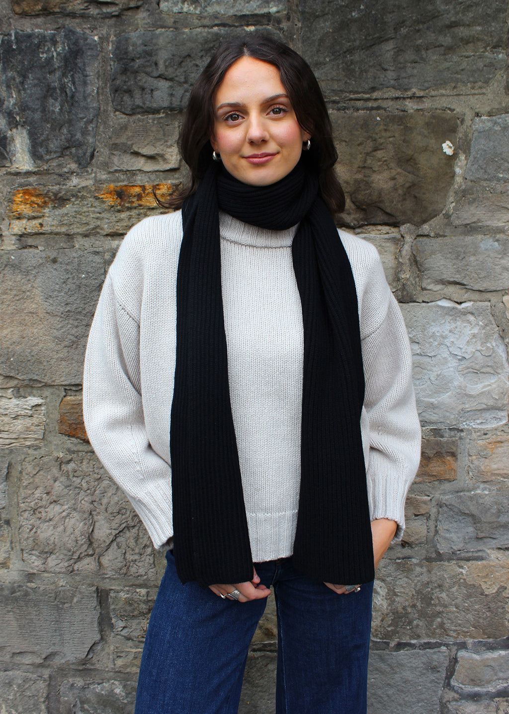 Cashmere ribbed scarf shown on model. Scottish Textiles Showcase.