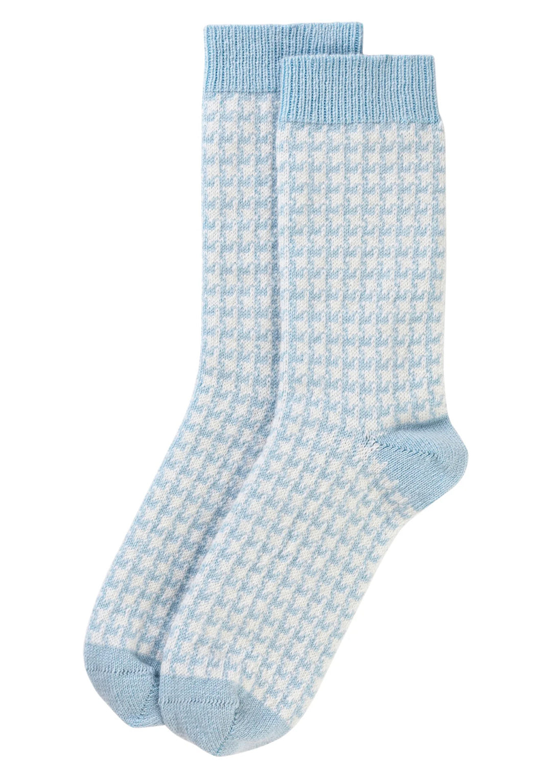 These cashmere bed socks come in a powder blue houndstooth pattern and will be sure to keep you warm and cosy.