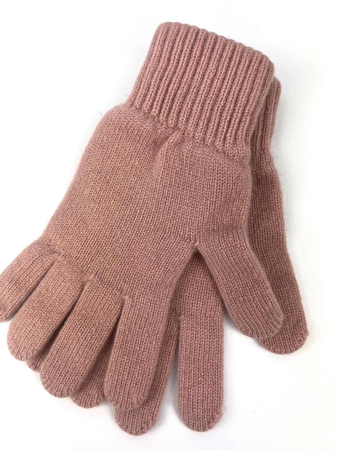 Rosie sugden cashmere gloves in shades of pink. Knitted in the Scottish borders
