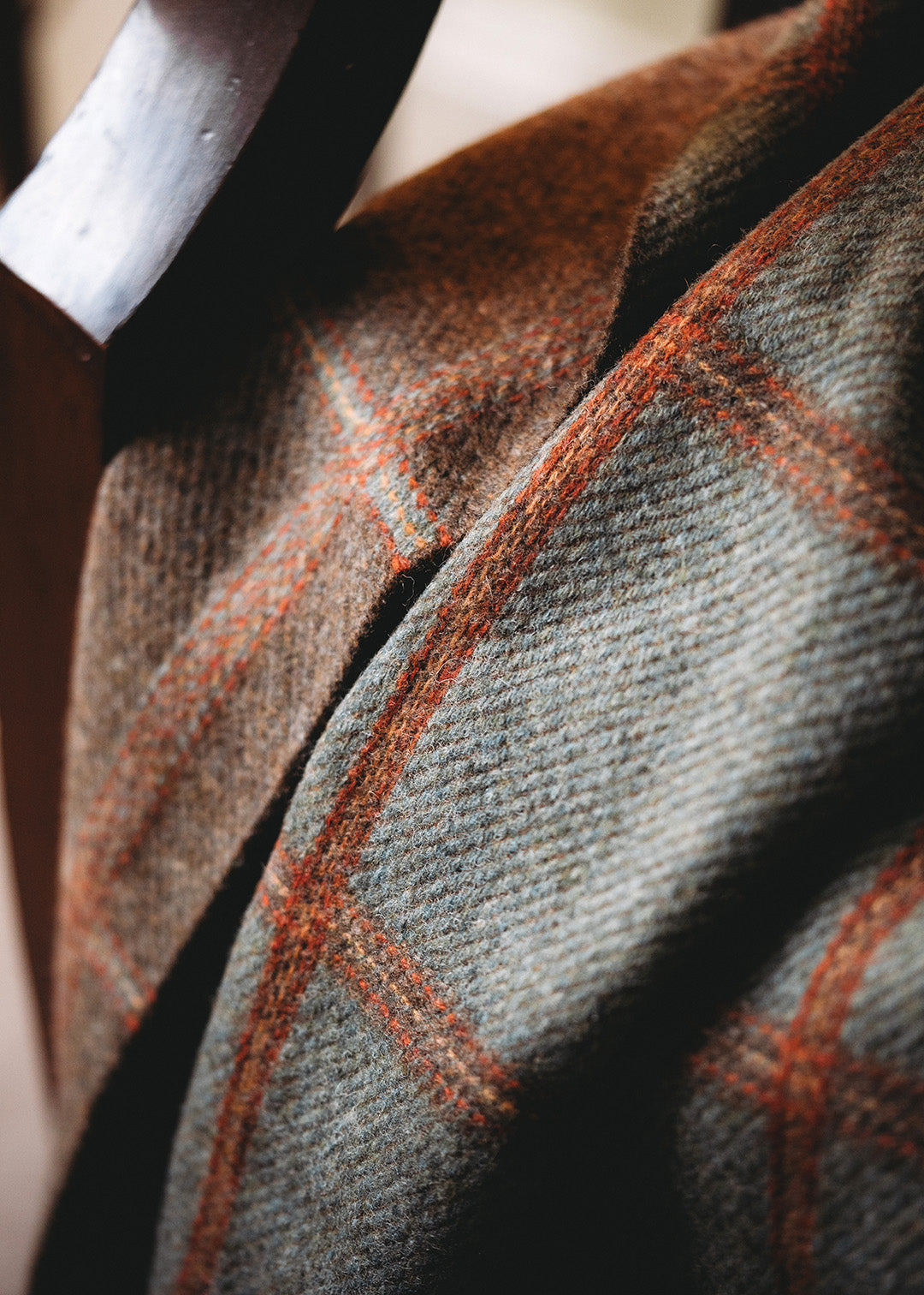 Reversible, checked wool throw in sea blue-green and brown.