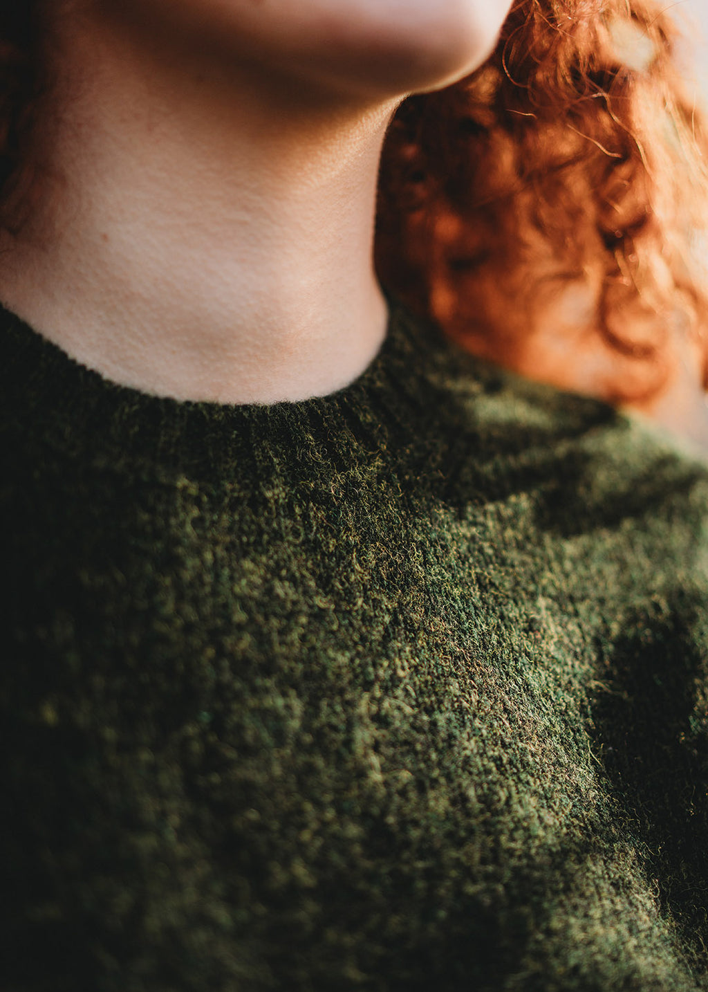 Shetland jumper in pine green shown on model. 
