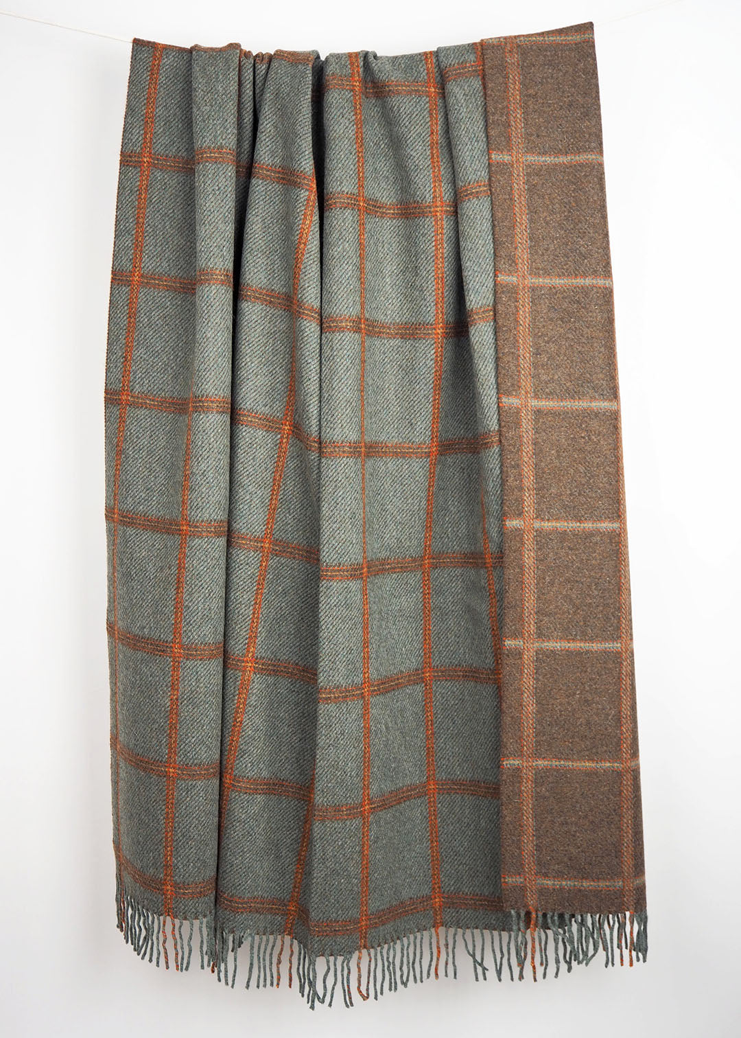 Solway mist wool throw, bespoke to the Scottish textiles showcase. Woven in Langholm