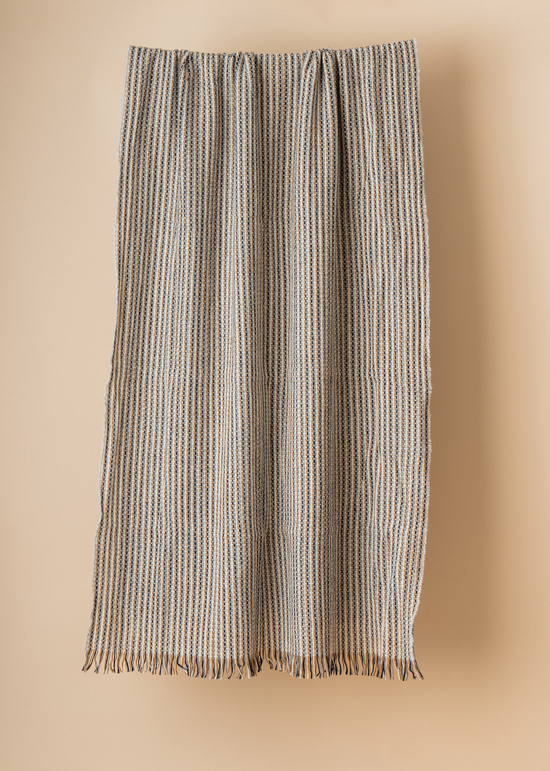 Wide cashmere scarf in white, brown and grey.