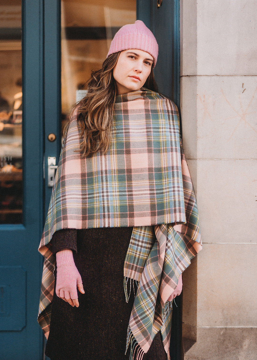 The Dundee Rose tartan serape is woven in a beautiful pastel colour palette featuring soft pink and mint green.
