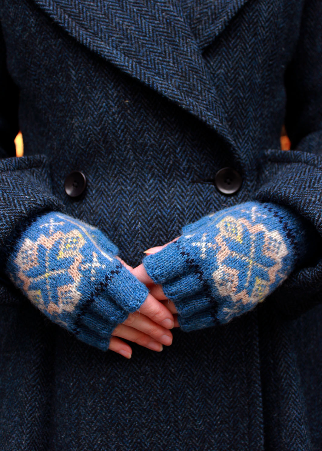Hand knitted Fair Isle fingerless gloves in shades of blue, made exclusively for Scottish Textiles Showcase..