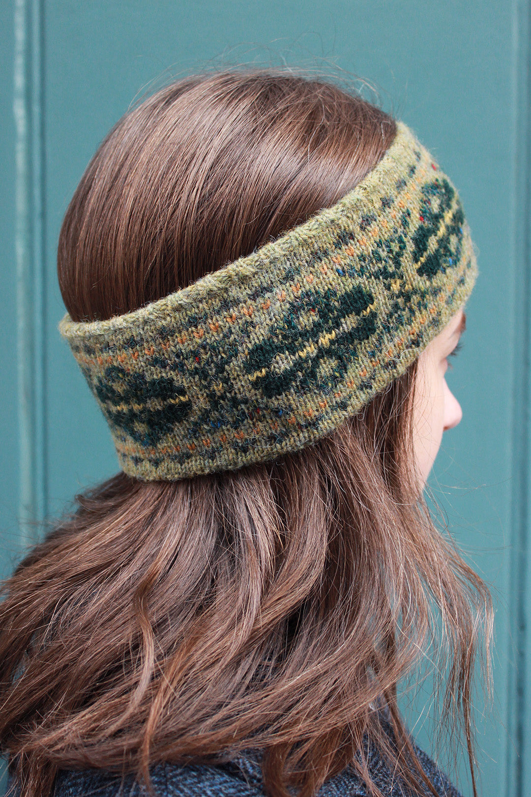 Hand knitted Fair Isle headband in shades of green, made exclusively for the Scottish Textiles Showcase.
