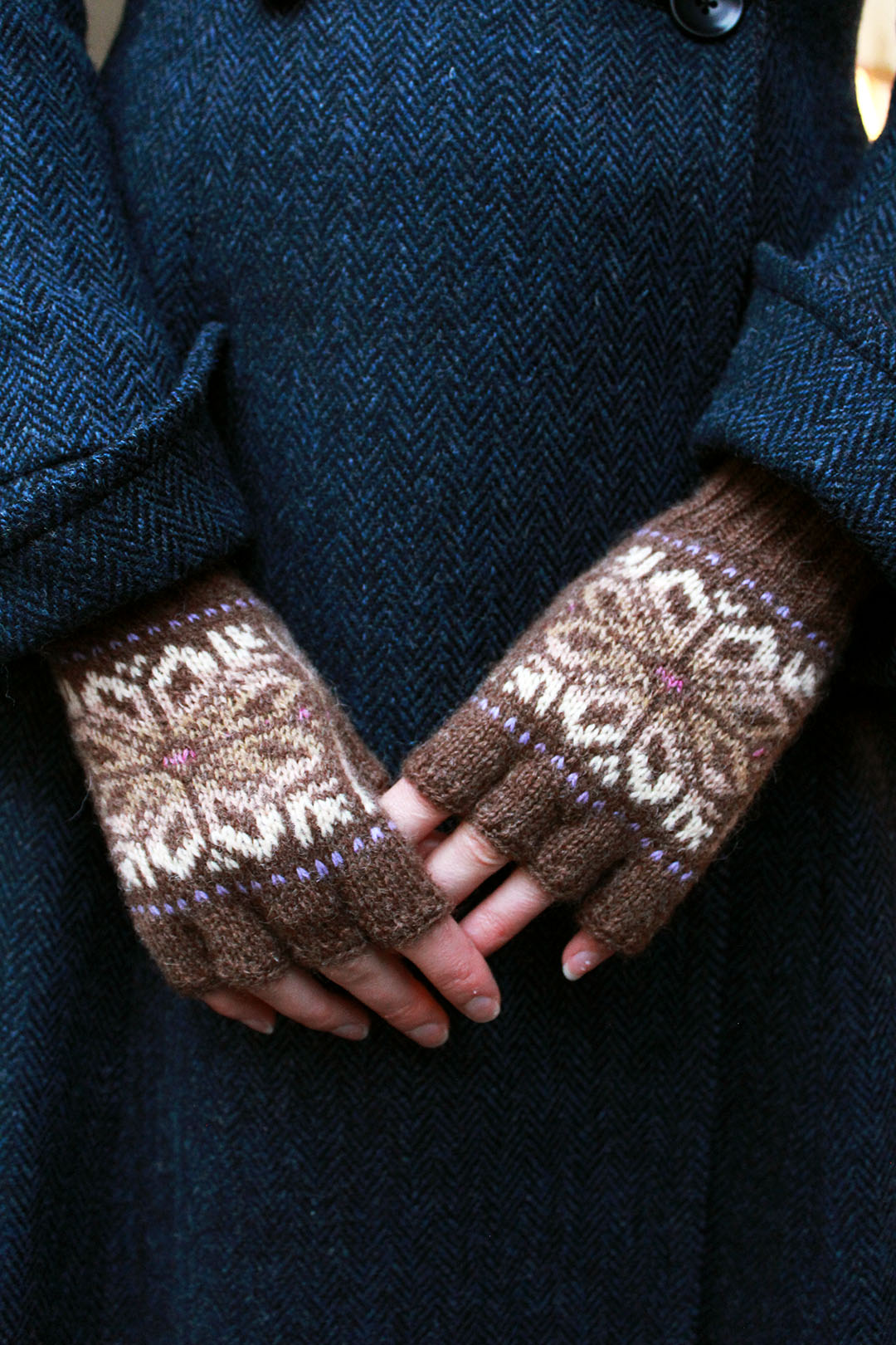 Hand knitted Fair Isle fingerless gloves in shades of brown, made exclusively for Scottish Textiles Showcase. 