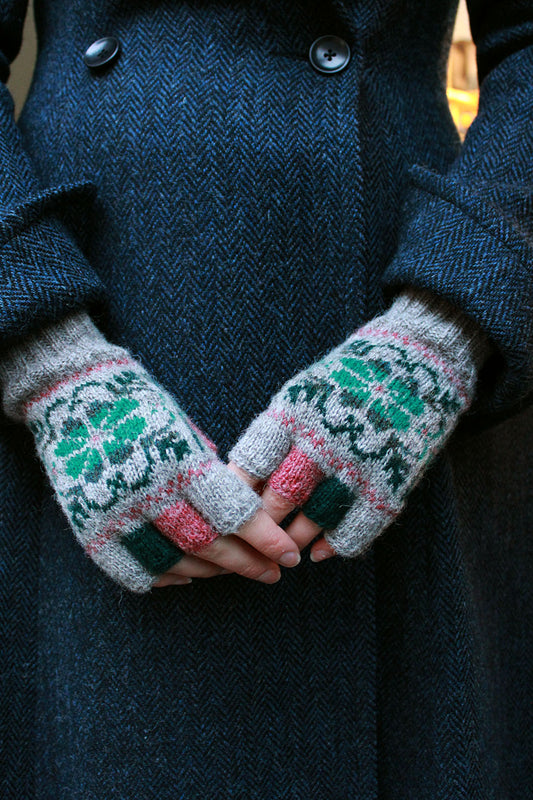 Hand knitted Fair Isle fingerless gloves in shades of grey, made exclusively for the Scottish Textiles Showcase. 