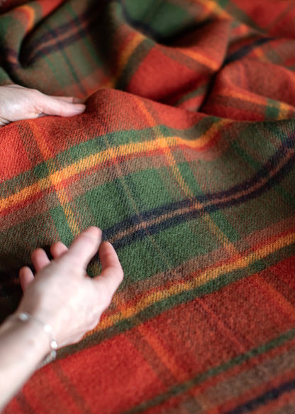 Limited edition Autumn Woodland Walk lambswool serape featuring an original plaid design by Araminta Campbell.