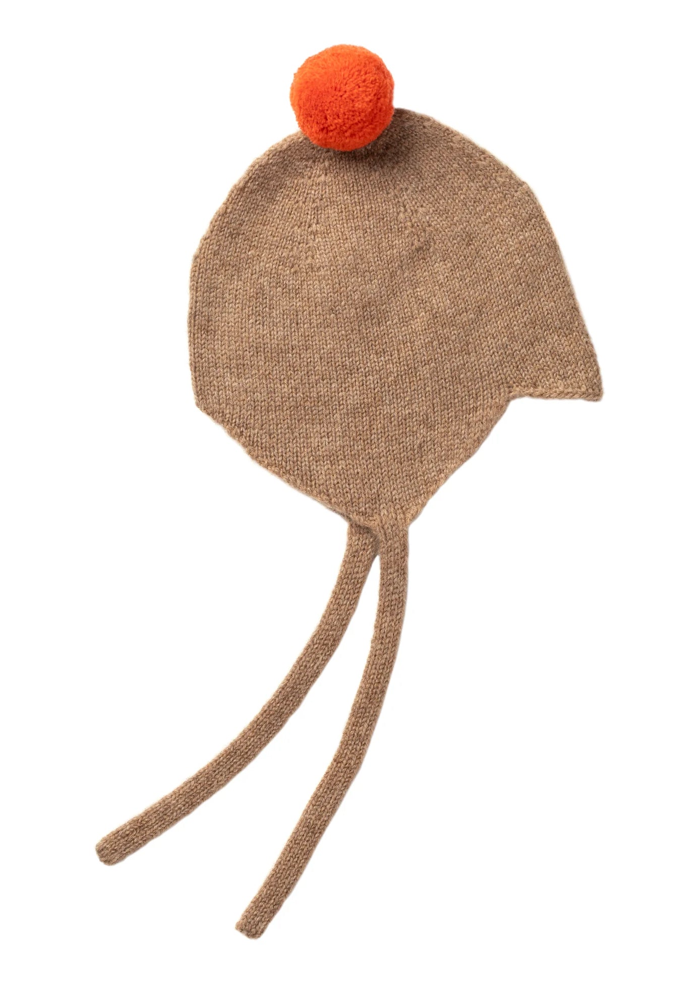 Cashmere baby bonnet in camel with a vibrant orange pom pom.