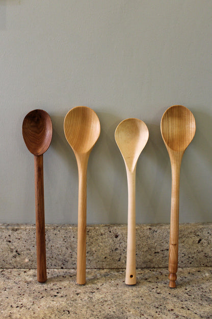 Big stirrer spoons, hand carved in Fife. Scottish textiles showcase.
