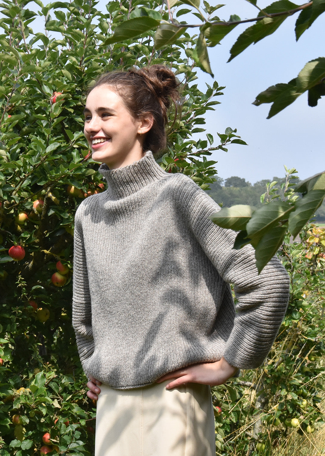 Luxury hand frame knitted jumper made with un-dyed, natural grey wool from Shetland sheep.
