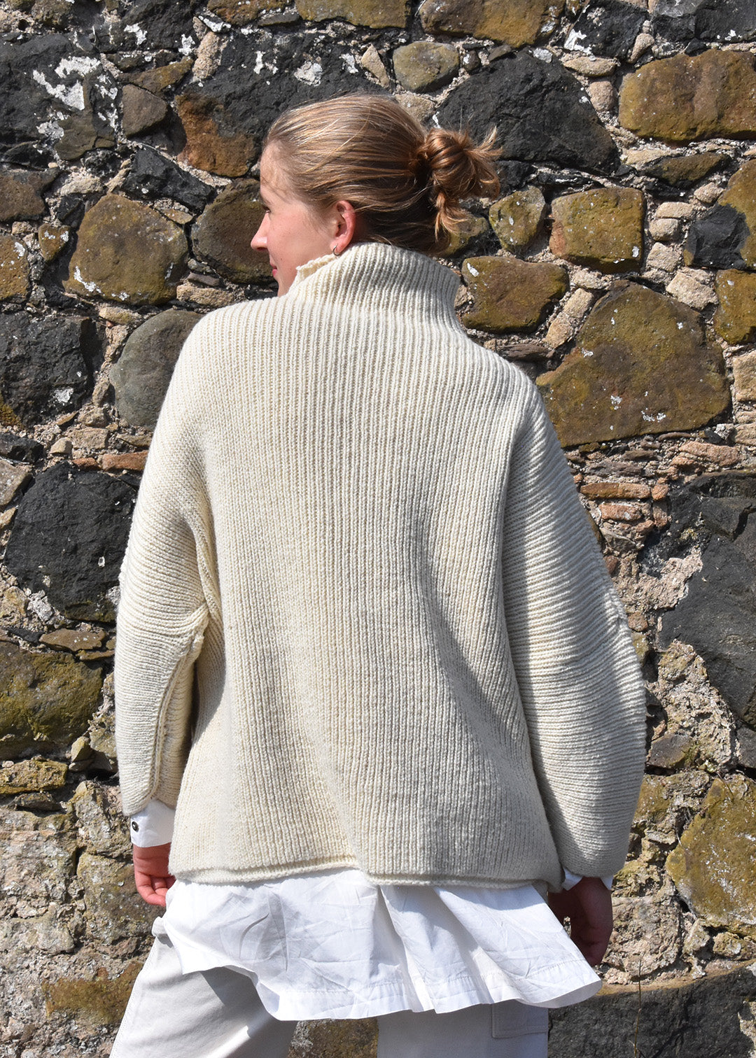 Luxury hand frame knitted jumper made with un-dyed wool from Shetland sheep.