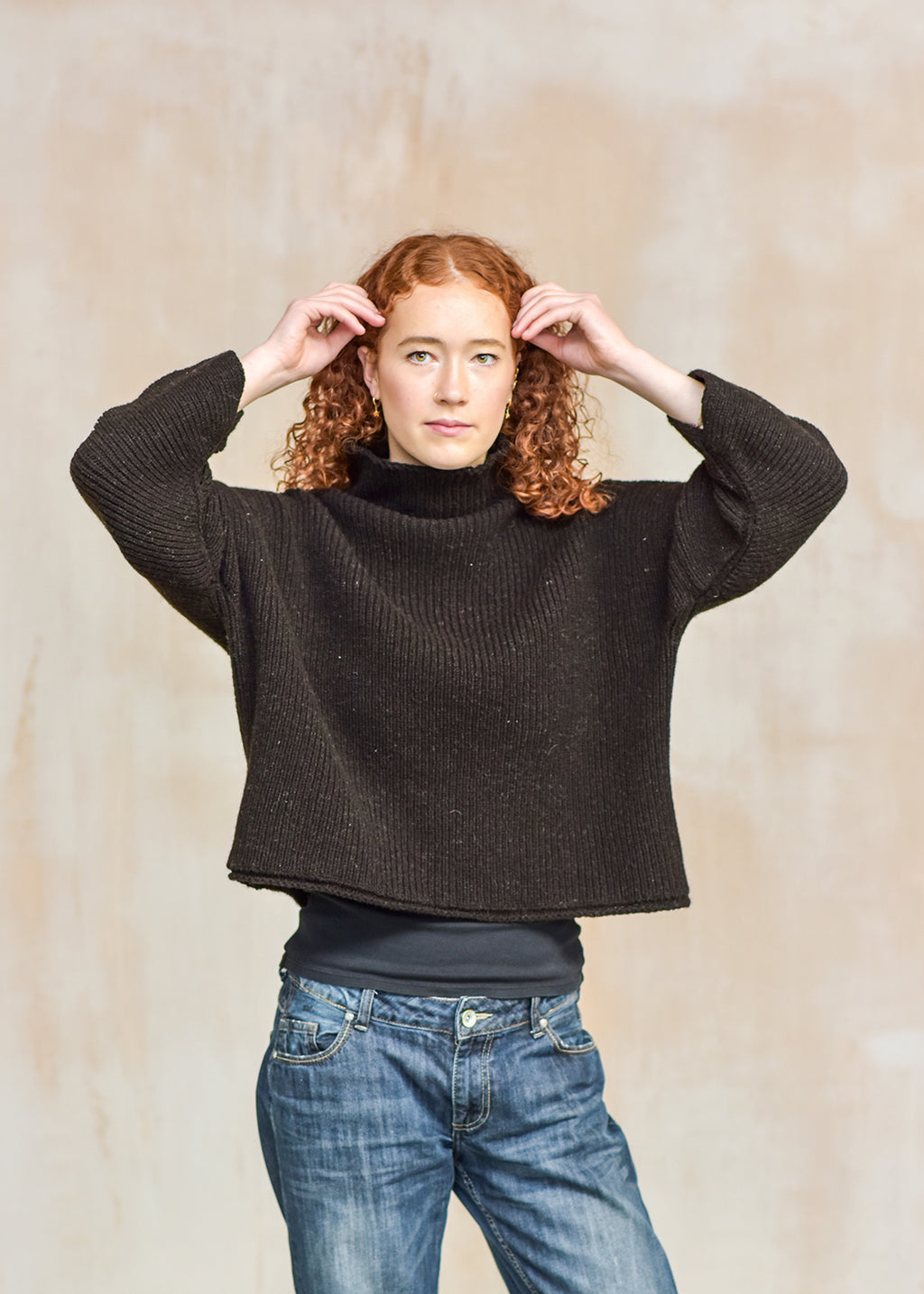 Luxury hand frame knitted jumper made with un-dyed, dark brown wool from Shetland sheep.