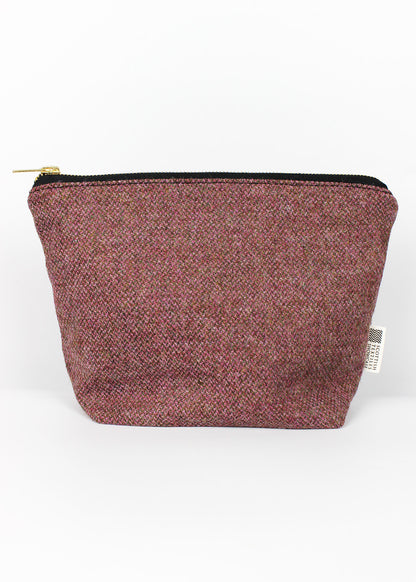 Borders tweed cosmetic bag in rose pink with brass zip.