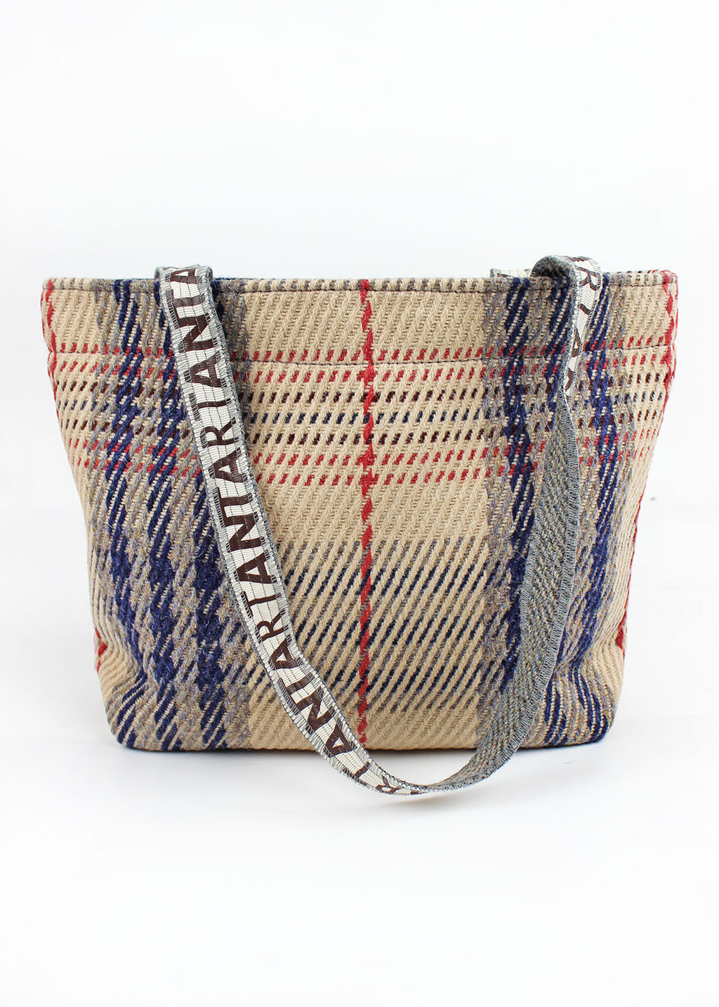 Wool carpet bag woven in peach, blue, pink and grey.