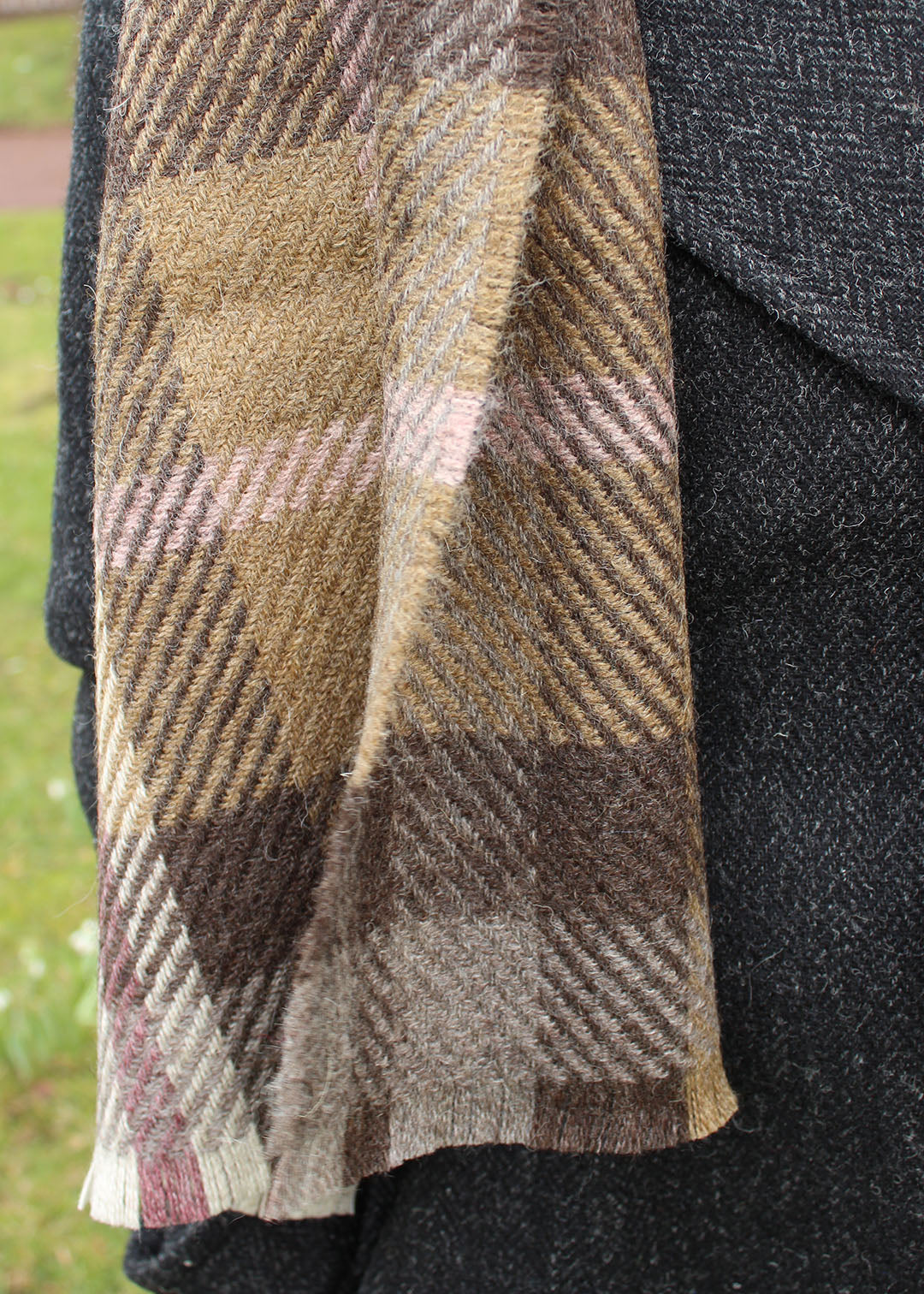 classic mauve checked scarf has been woven in Scotland using 100% wool sustainably sourced in the UK from British reared sheep