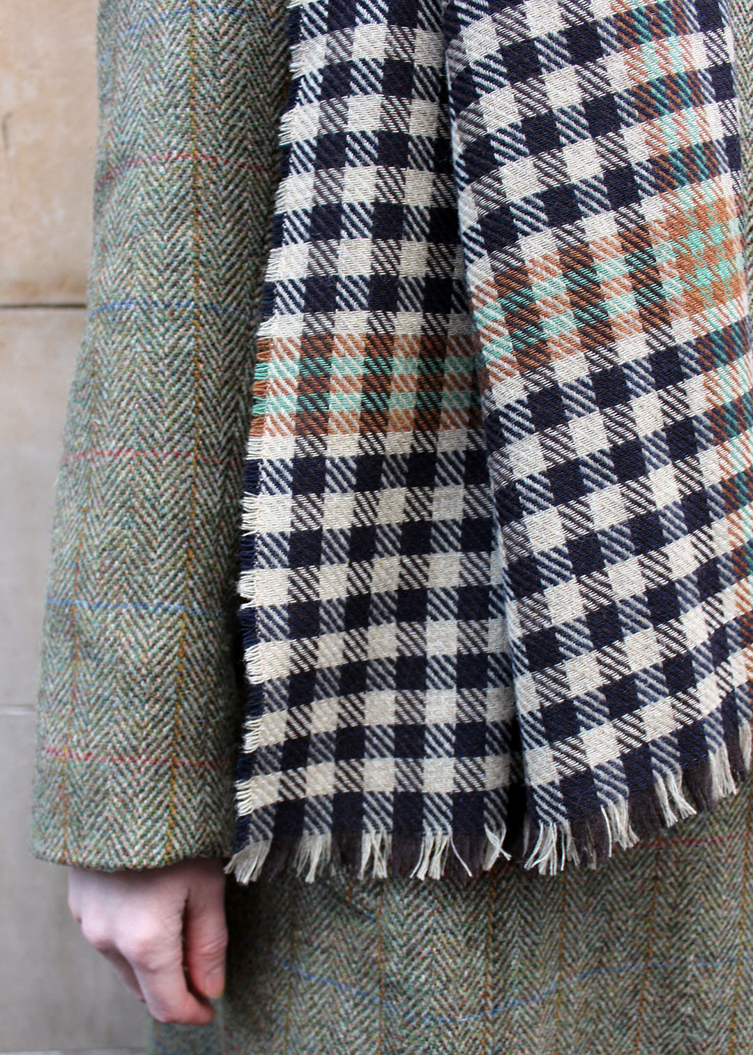 Brock lambswool and cashmere stole in black, rust, camel and lime green check.