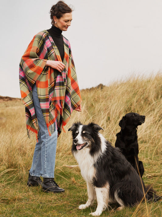 Wool serape in Bruce of Kinnaird tartan, shown on model.