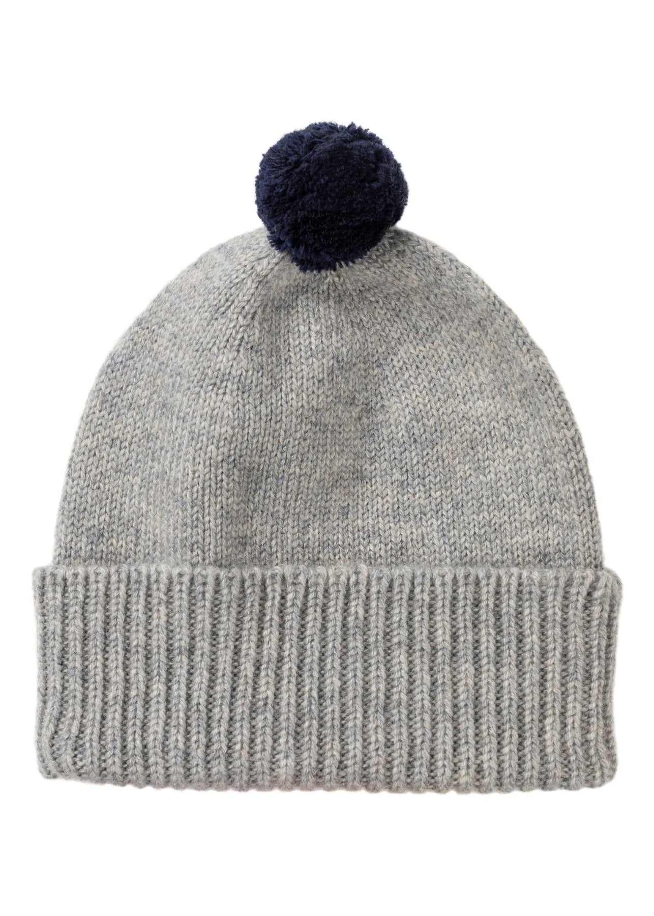 Children's cashmere  beanie in light grey with a navy pom pom.