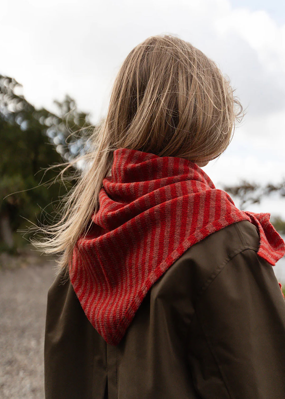Knitted lambswool triangle scarf in cinder stripe.