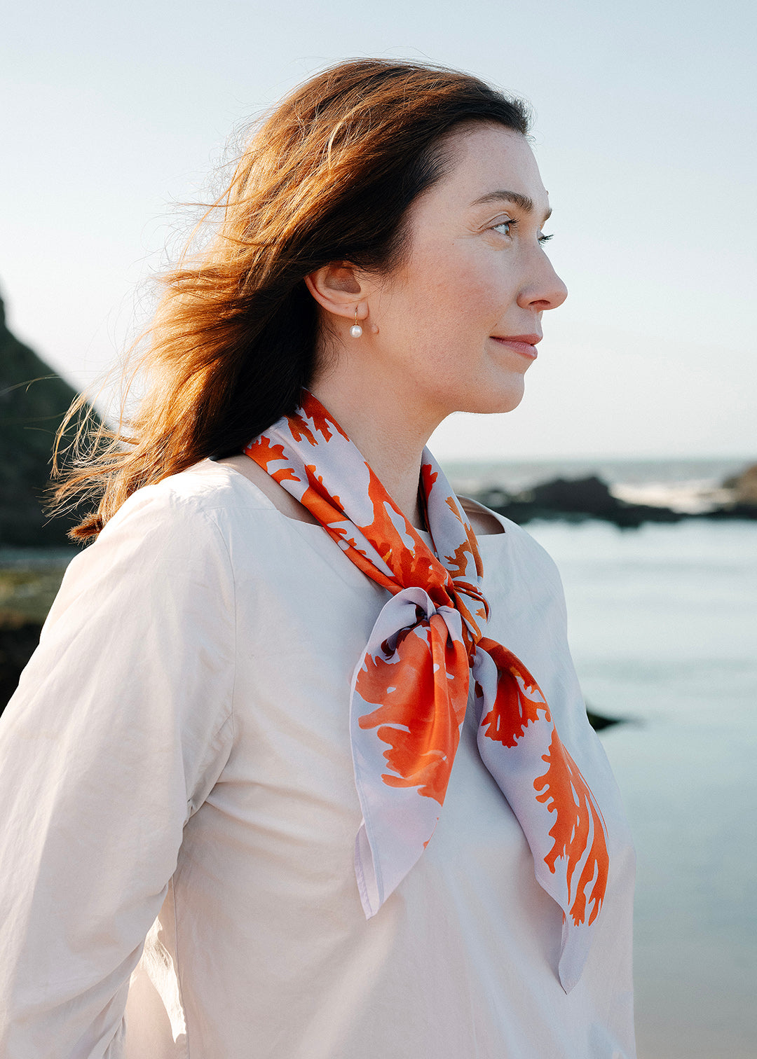 The Drift silk scarf features a collaged print of seaweeds found on the coastline of the Isle of Mull.
