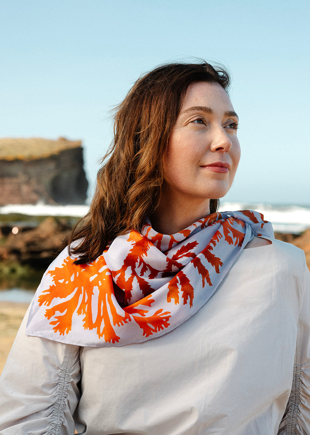 The Drift silk scarf features a collaged print of seaweeds found on the coastline of the Isle of Mull.