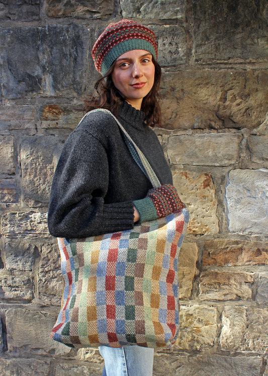 Model shown with Uist carpet bag.Scottish Textiles Showcase.
