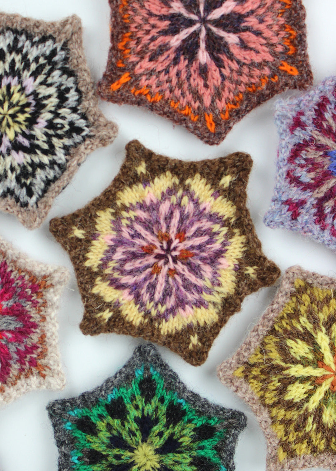 Fair Isle knitted coasters made in Shetland from Shetland sheep wool by Hazel Tindall, the fastest knitter in the world. Scottish Textiles Showcase.