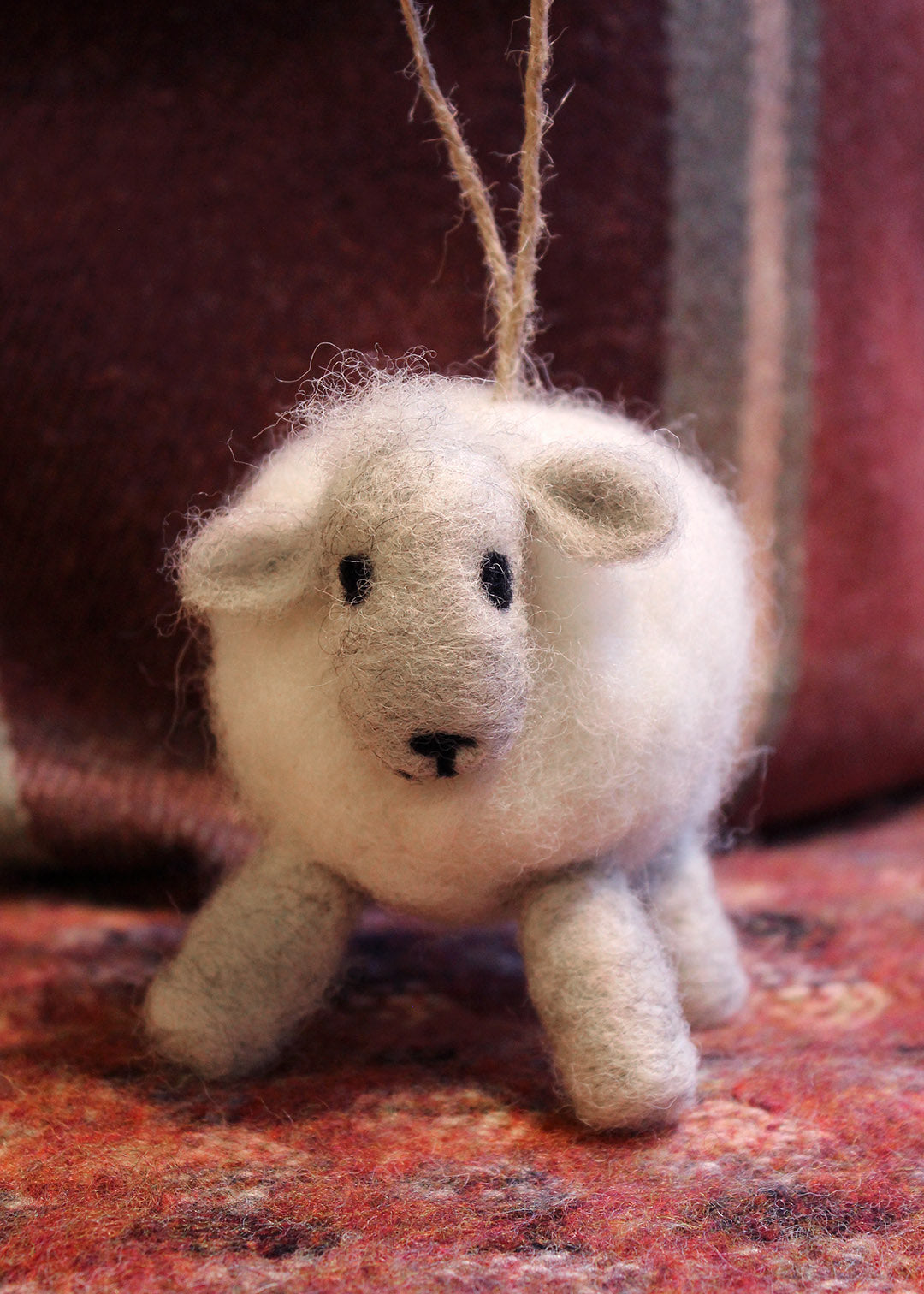 Handmade felted sheep decoration made with wool from the Scottish Borders.