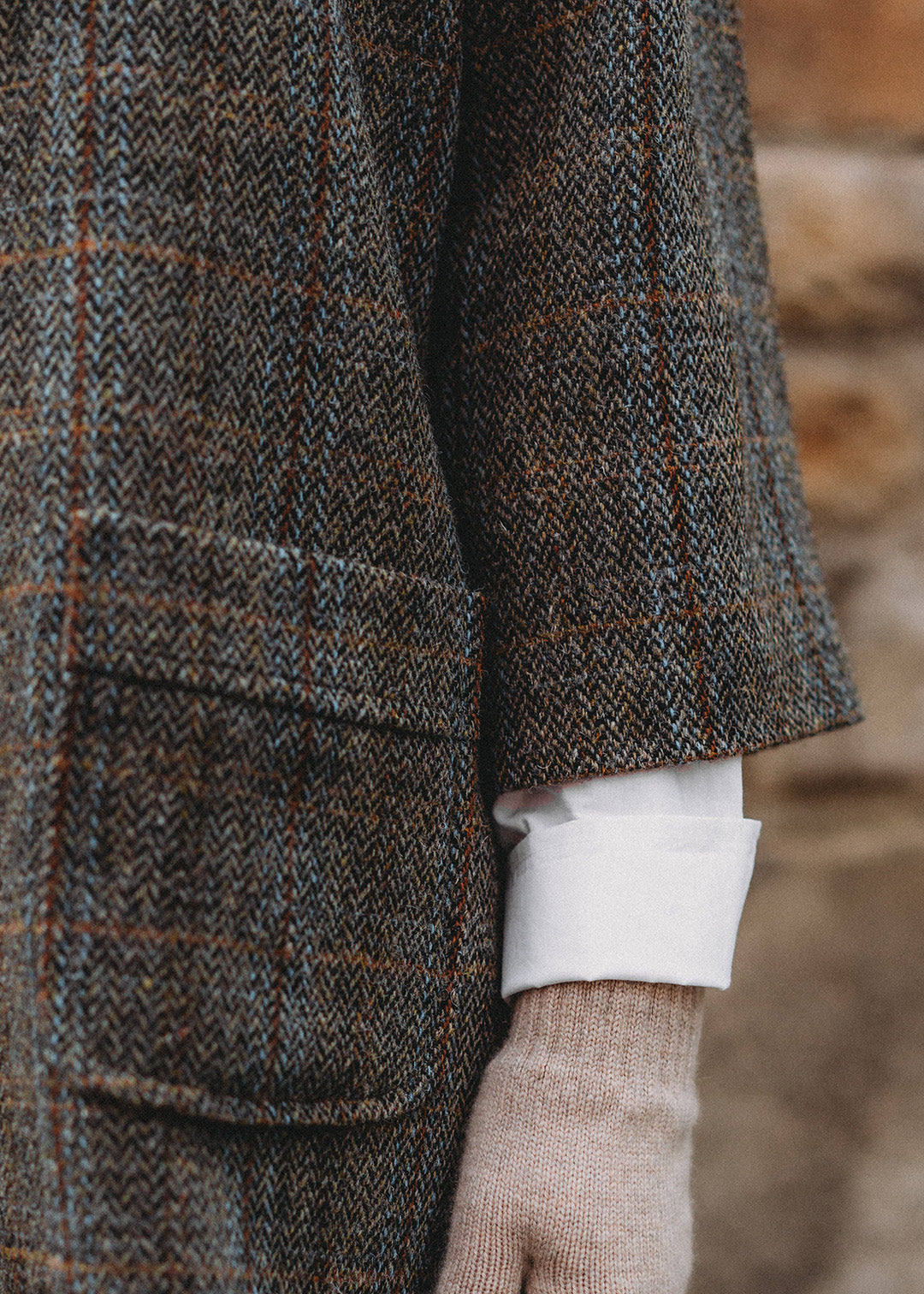Pure wool Harris Tweed coat in a brown herringbone check.