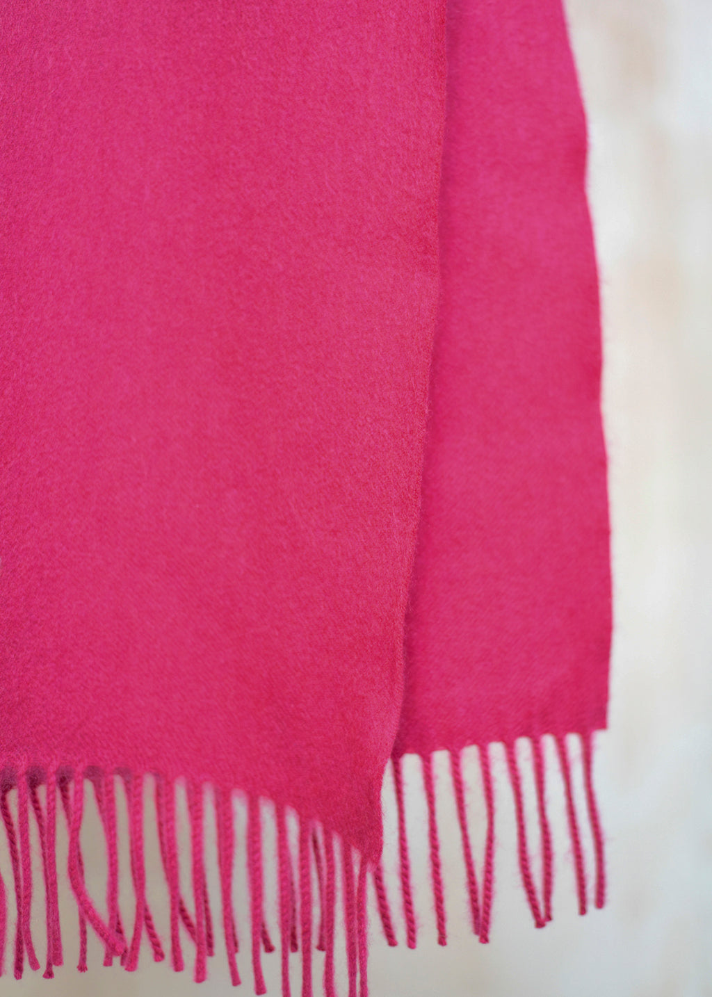 Beautifully soft, wide cashmere scarf in a deep fuchsia pink.