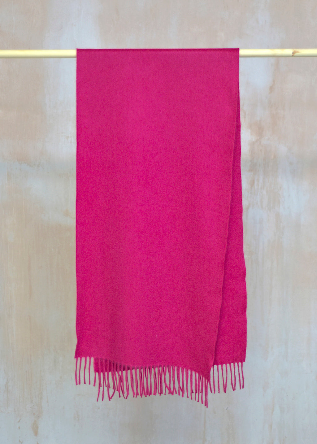 Beautifully soft, wide cashmere scarf in a deep fuchsia pink.