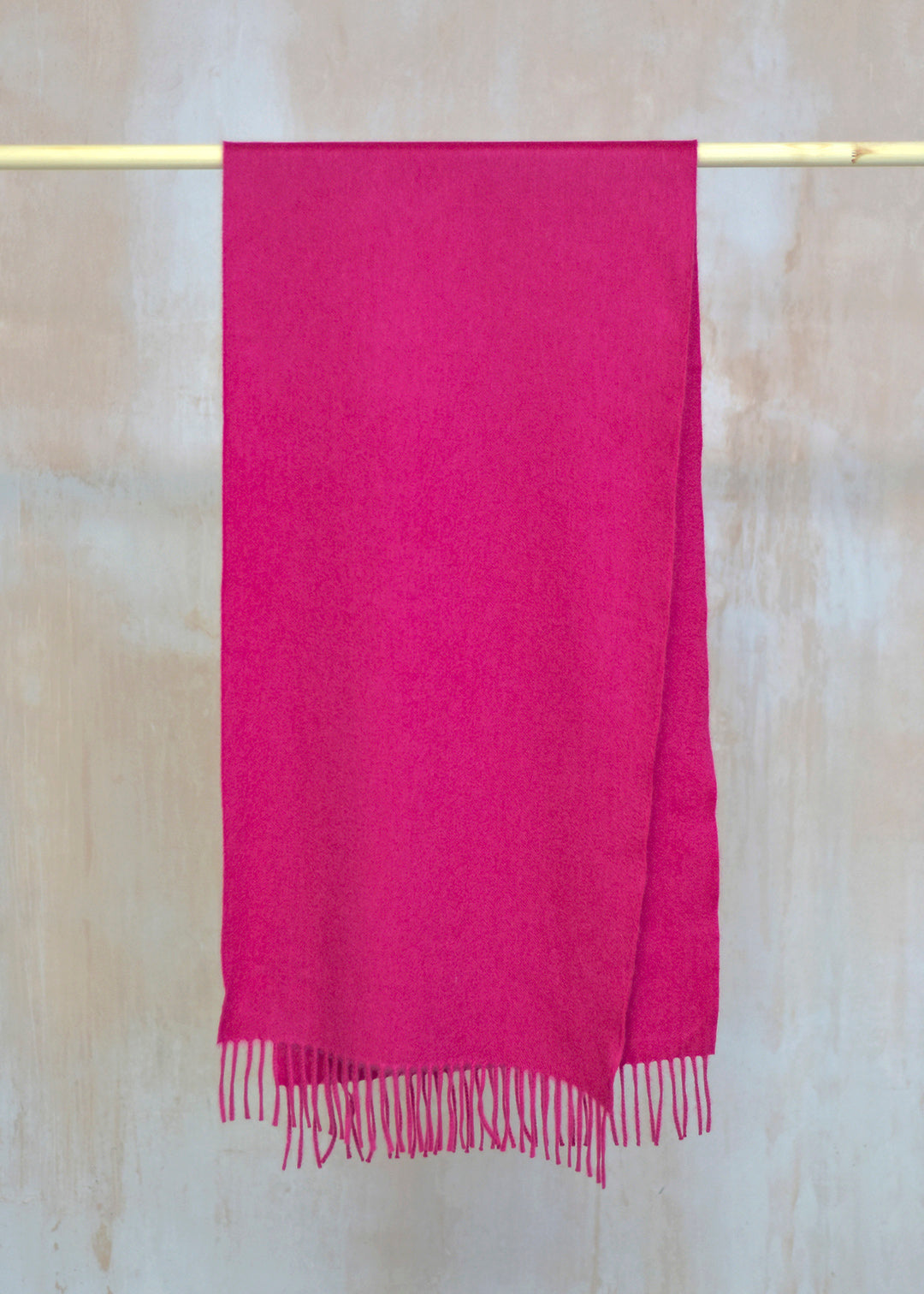 Beautifully soft, wide cashmere scarf in a deep fuchsia pink.