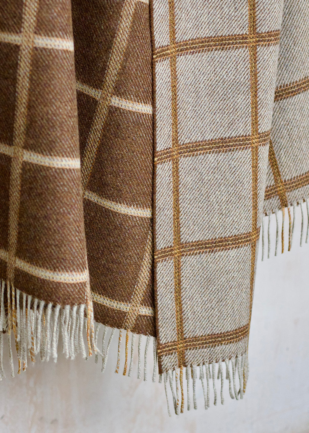 Reversible, pure wool checked blanket.