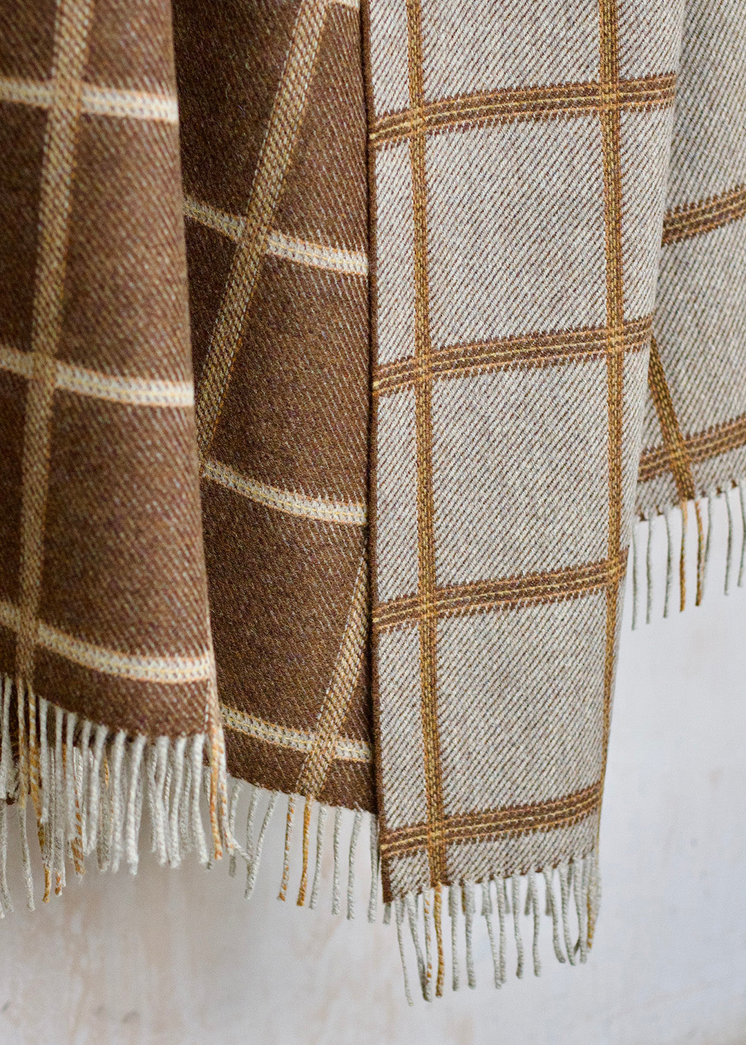 Reversible, pure wool checked blanket.