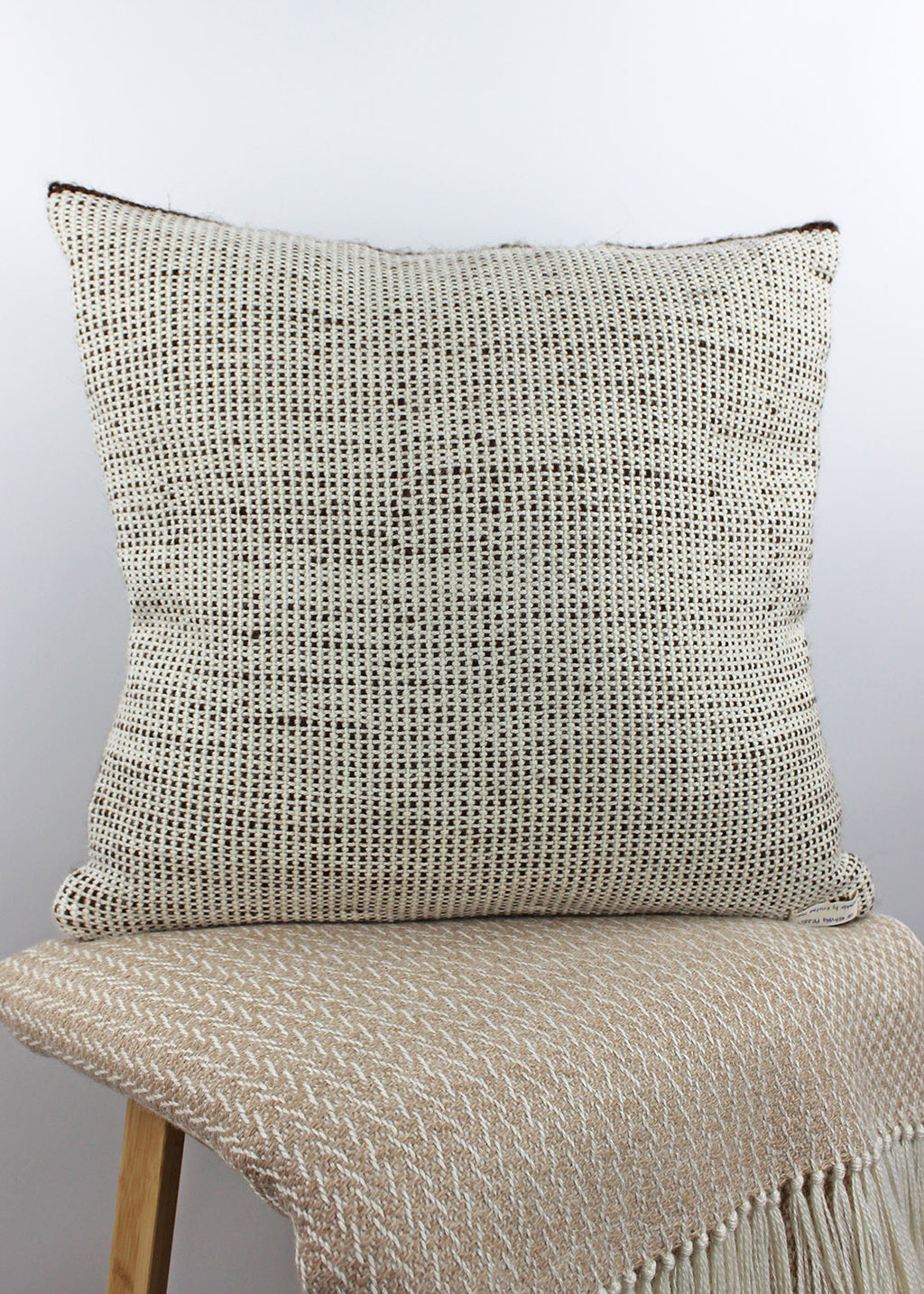 Limited edition, handwoven alpaca cushion in natural, un-dyed cream and brown. Made in Edinburgh by spinner, dyer and weaver Kristina Taylor.