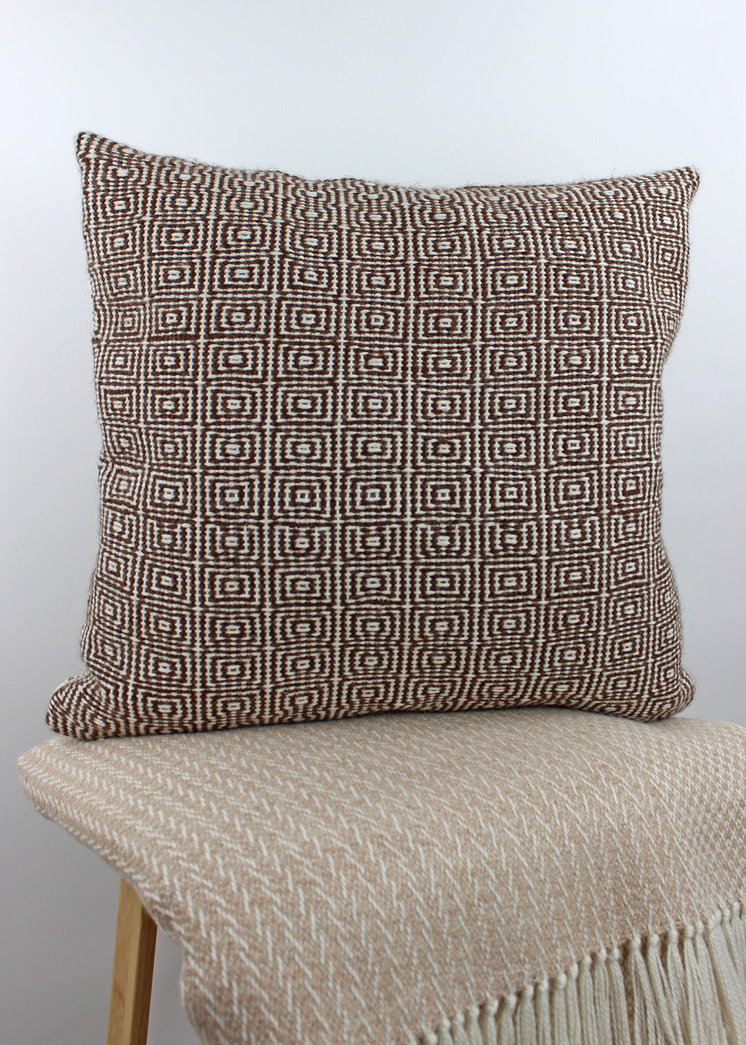 Limited edition, handwoven alpaca cushion in natural, un-dyed cream and brown. Made in Edinburgh by spinner, dyer and weaver Kristina Taylor.