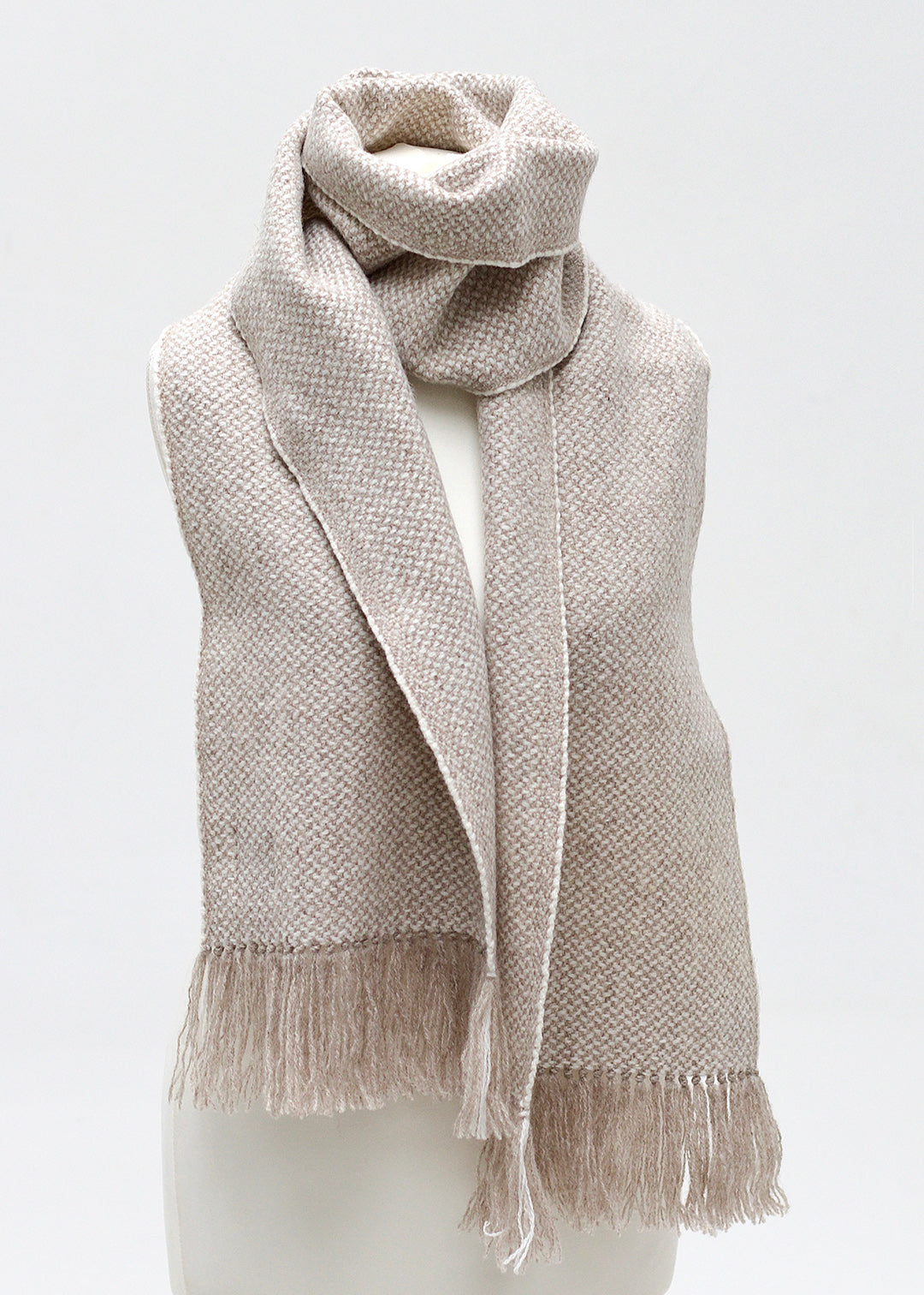 Handwoven, British wool scarf in natural, un-dyed shades.