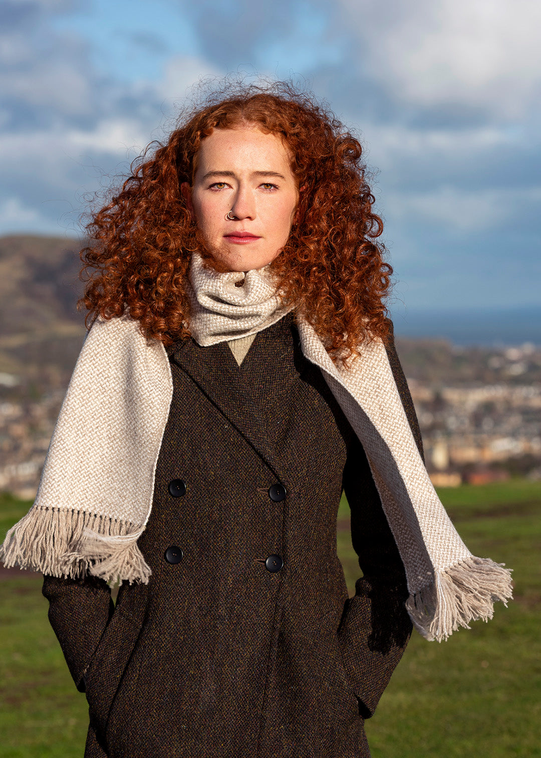 Handwoven, British wool scarf in natural, un-dyed shades.