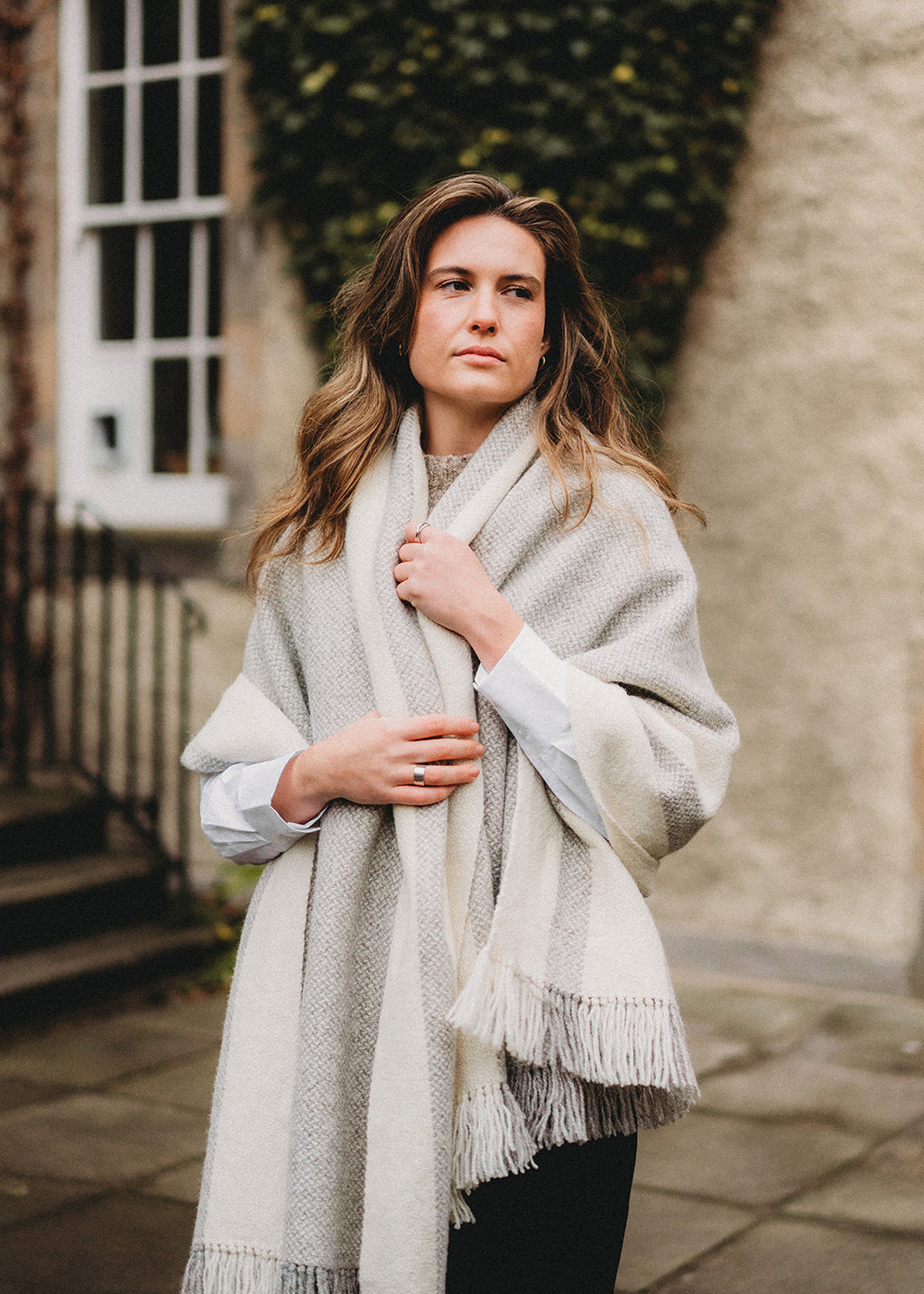Handwoven Falkland Estate blanket in natural grey and off white.