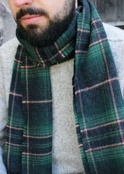 Kings of Scotland wool scarf shown on model. Scottish Textiles Showcase.