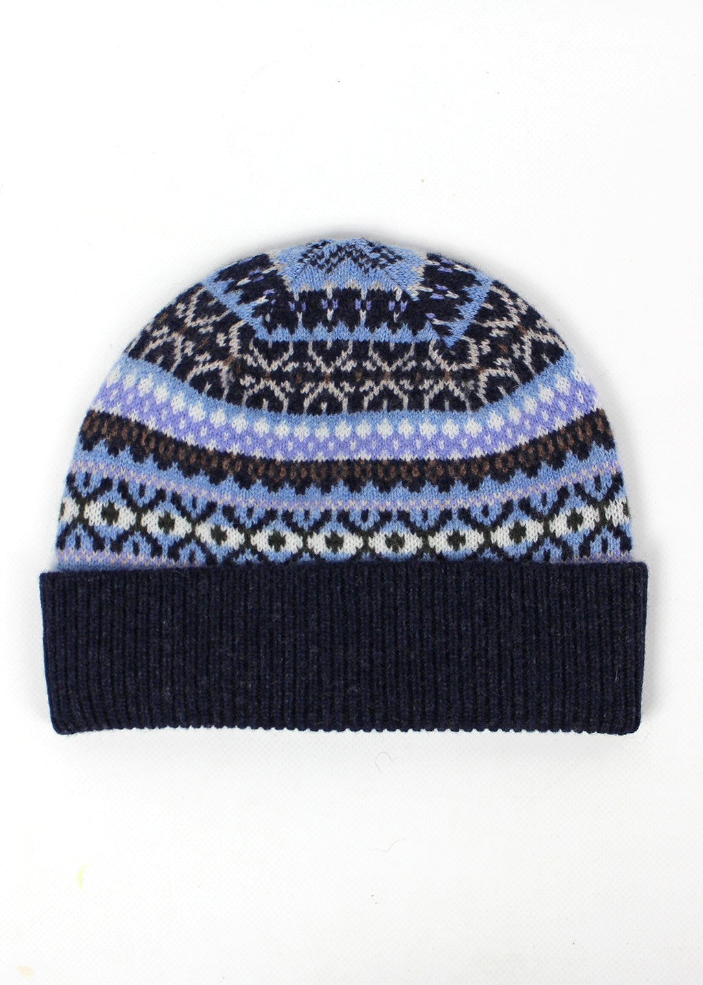 Knitted lambswool beanie in midnight blue with a playful Fair Isle pattern in pale blue, lilac and white.