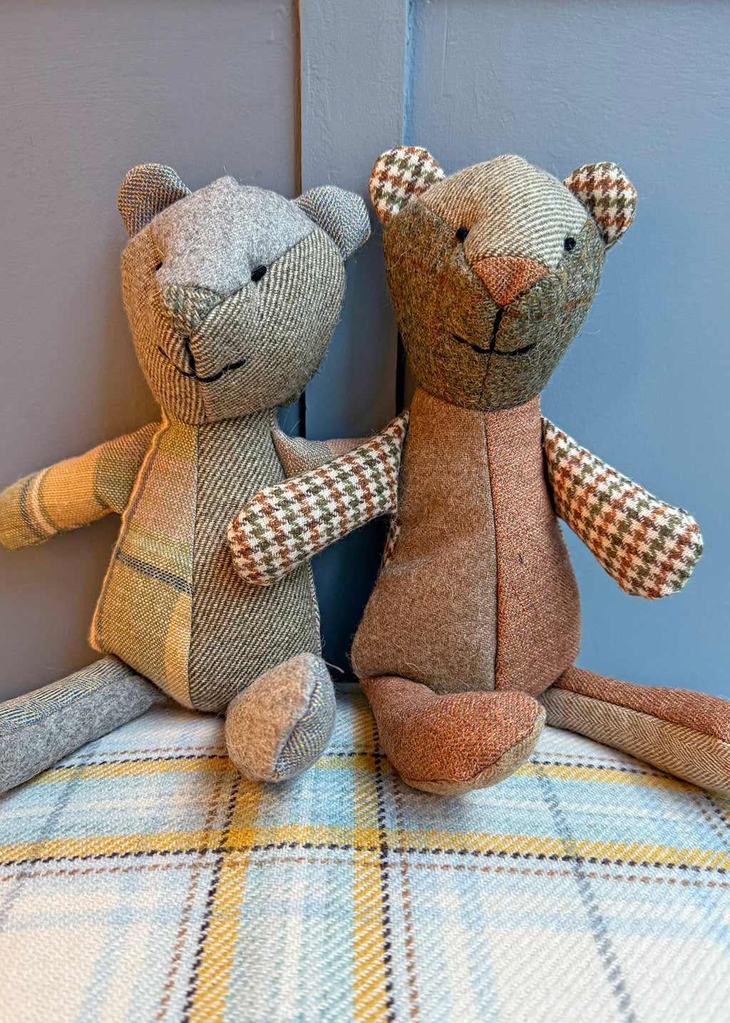 Unique patchwork tweed bear with different patterns and colours in shades of green tweed paired with natural tones.