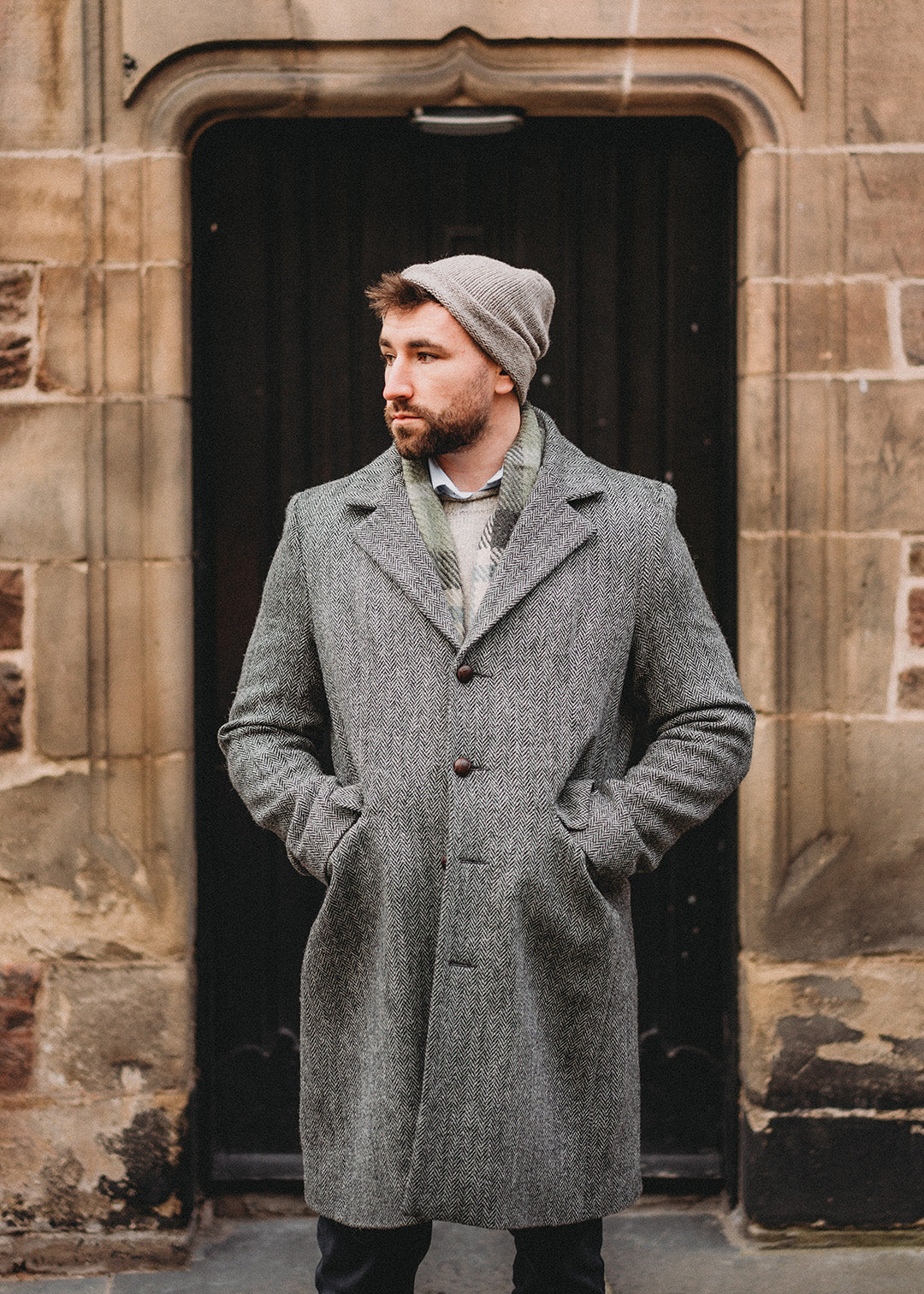 Pure wool, Harris Tweed men's coat in grey herringbone.
