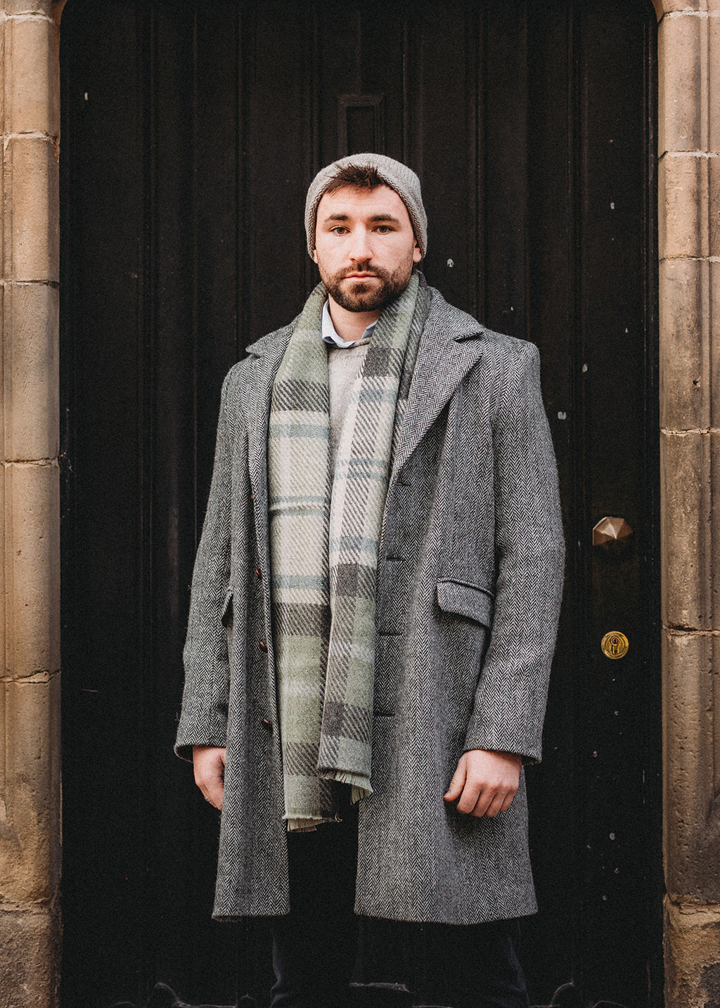 Pure wool, Harris Tweed men's coat in grey herringbone.