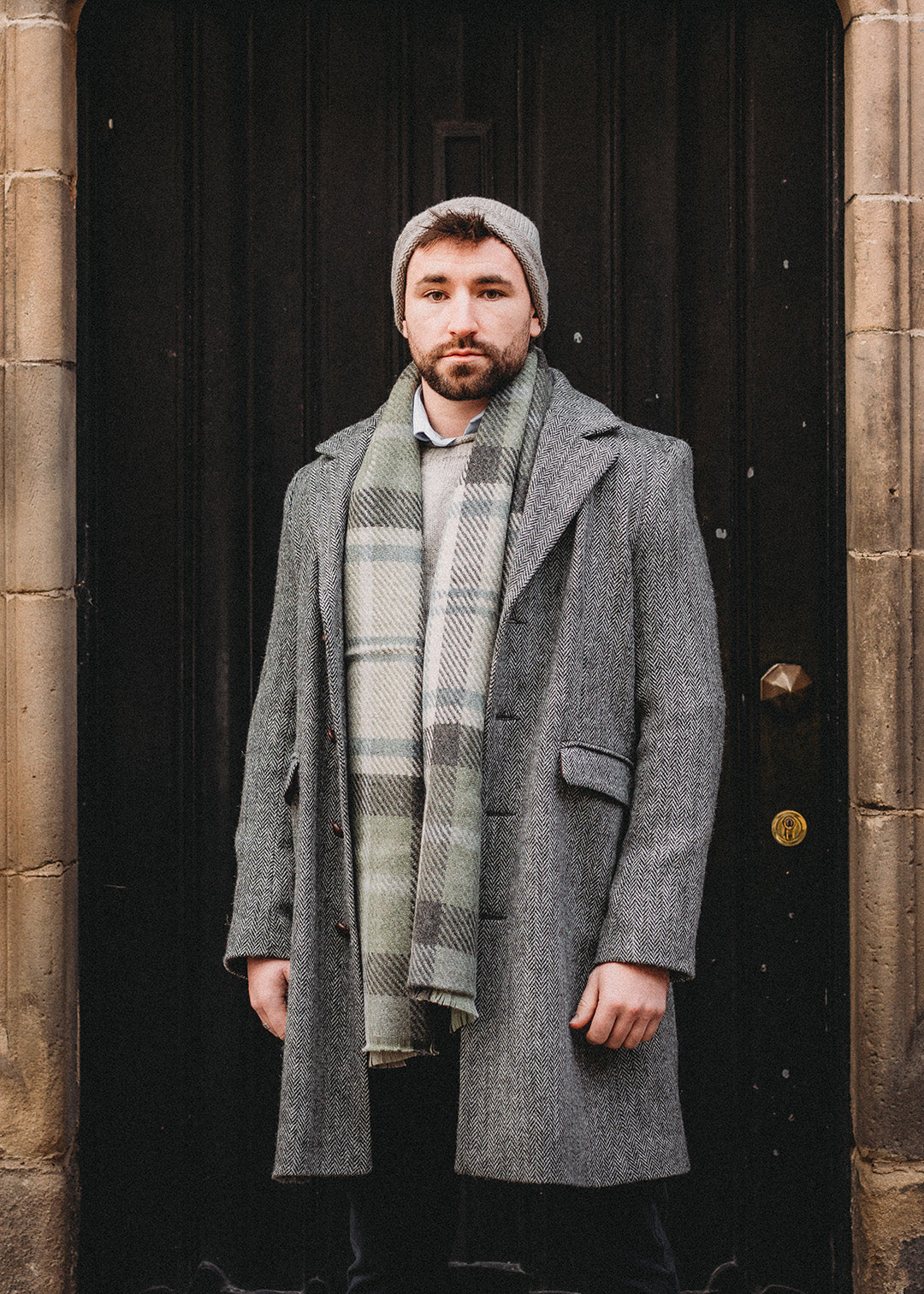 Pure wool, Harris Tweed men's coat in grey herringbone.