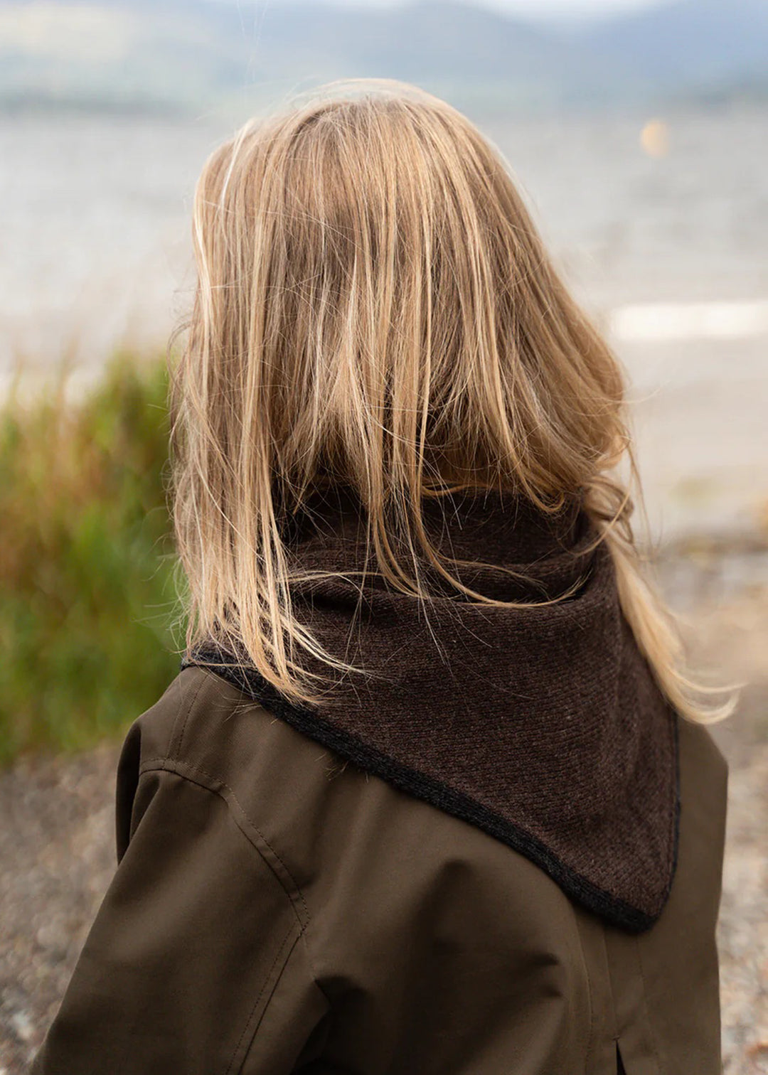 Knitted lambswool triangle scarf in dark brown with a charcoal trim.