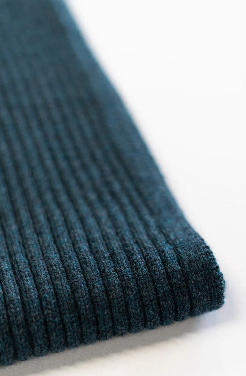 Jacquard ribbed scarf knitted in Ayrshire in sumptuously soft lambswool by Hilary Jane Keyes. In shade Lugano - deep teal